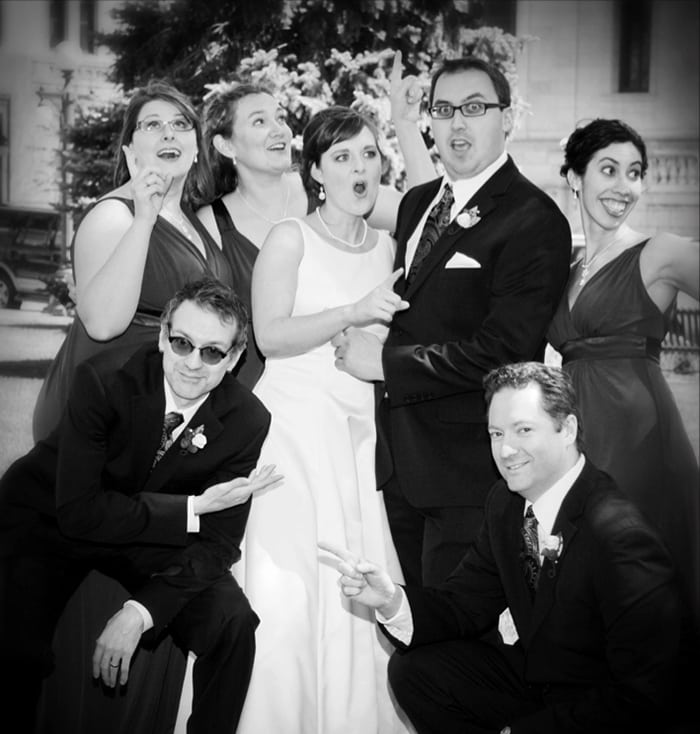 Sarah Roberts Delacueva, Brian Peterson Delacueva, and their wedding party. Photo courtesy of Michael Murray