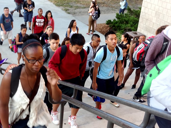 Students stream into Central High School during "Opening Week," 2012